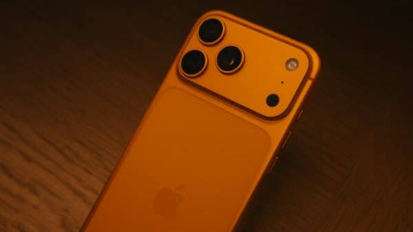 Orange smartphone with triple camera system
