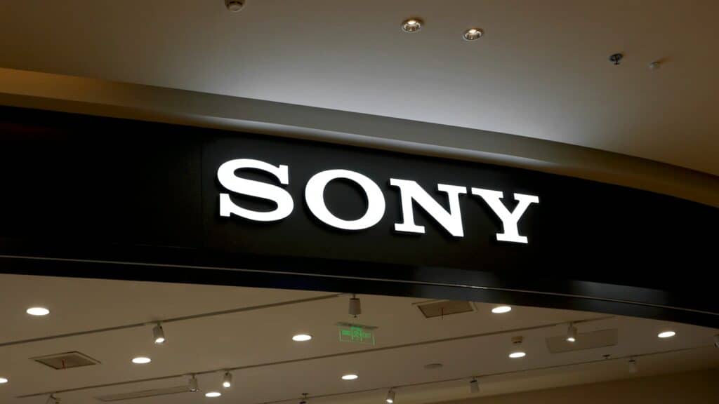a sony store sign hanging from the ceiling