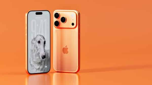 Two rose gold iphones on an orange background