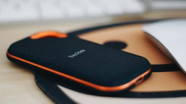 orange and black jbl portable speaker