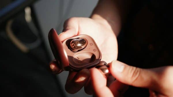 person holding black and gray device