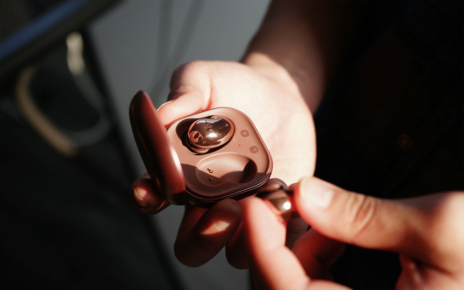 person holding black and gray device