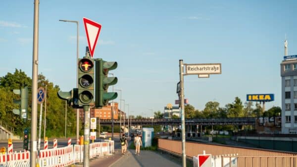 Traffic light on a street with buildings and buildings