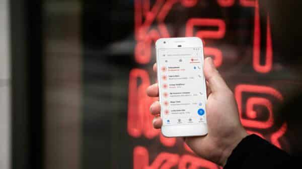 person holding white samsung galaxys 4