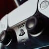 silver and black game controller