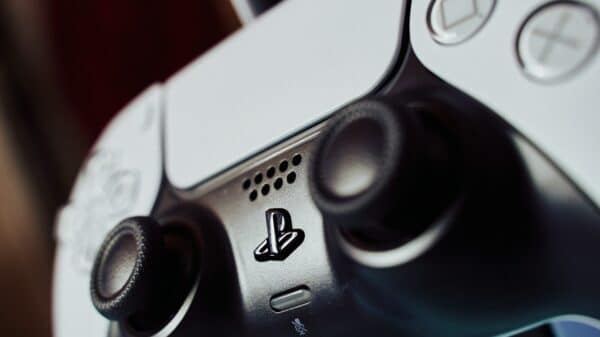 silver and black game controller