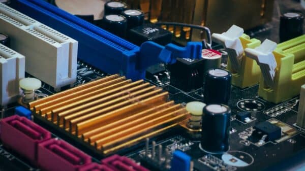Close-up of a computer motherboard with colorful components.