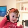 baby listening in black headset