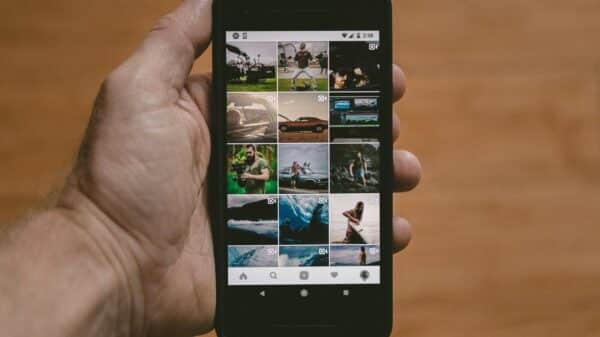 person holding black Android smartphone