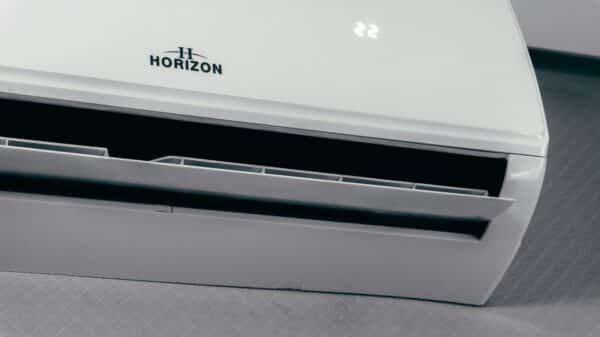 White air conditioner unit displaying 22 degrees