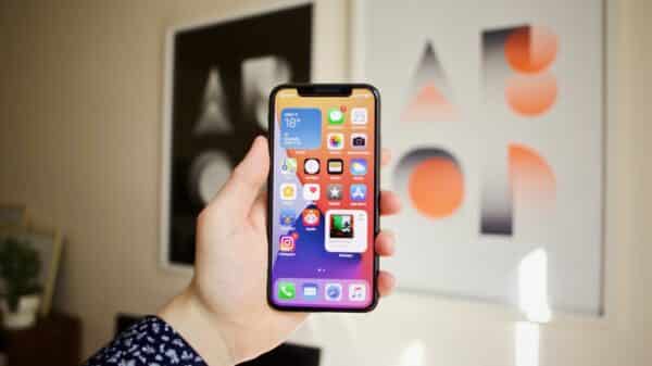 person holding black iphone 4