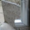 a close up of a metal object on a wall
