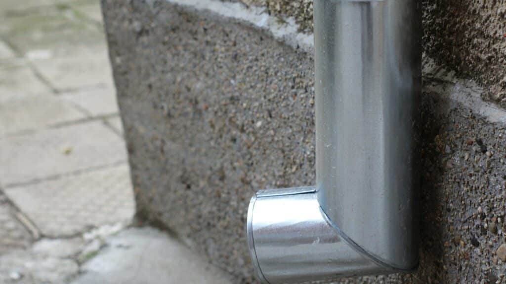 a close up of a metal object on a wall