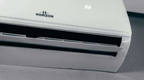 White air conditioner unit displaying 22 degrees