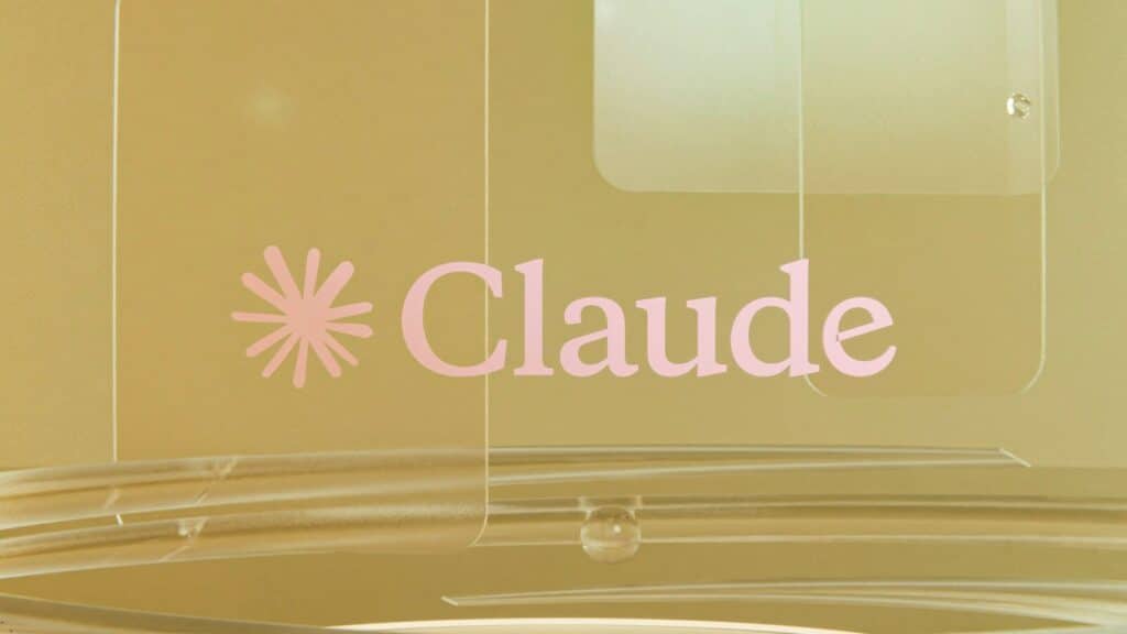 Pink claude logo on a golden background with clear elements
