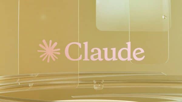 Pink claude logo on a golden background with clear elements