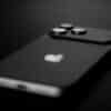 Black smartphone with three camera lenses on back